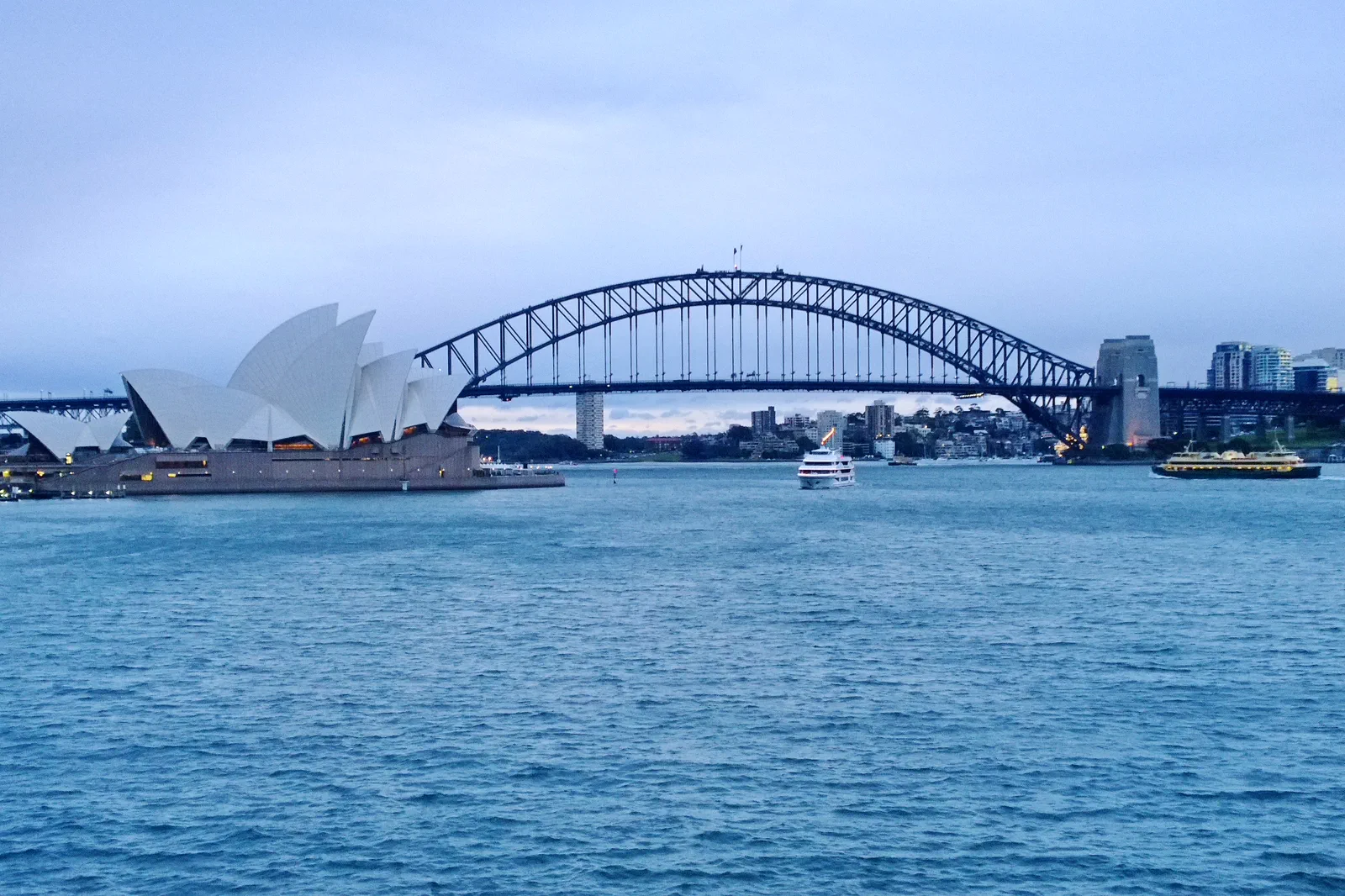 Sydney Opera House and Harbour Bridge across Sydney Harbour