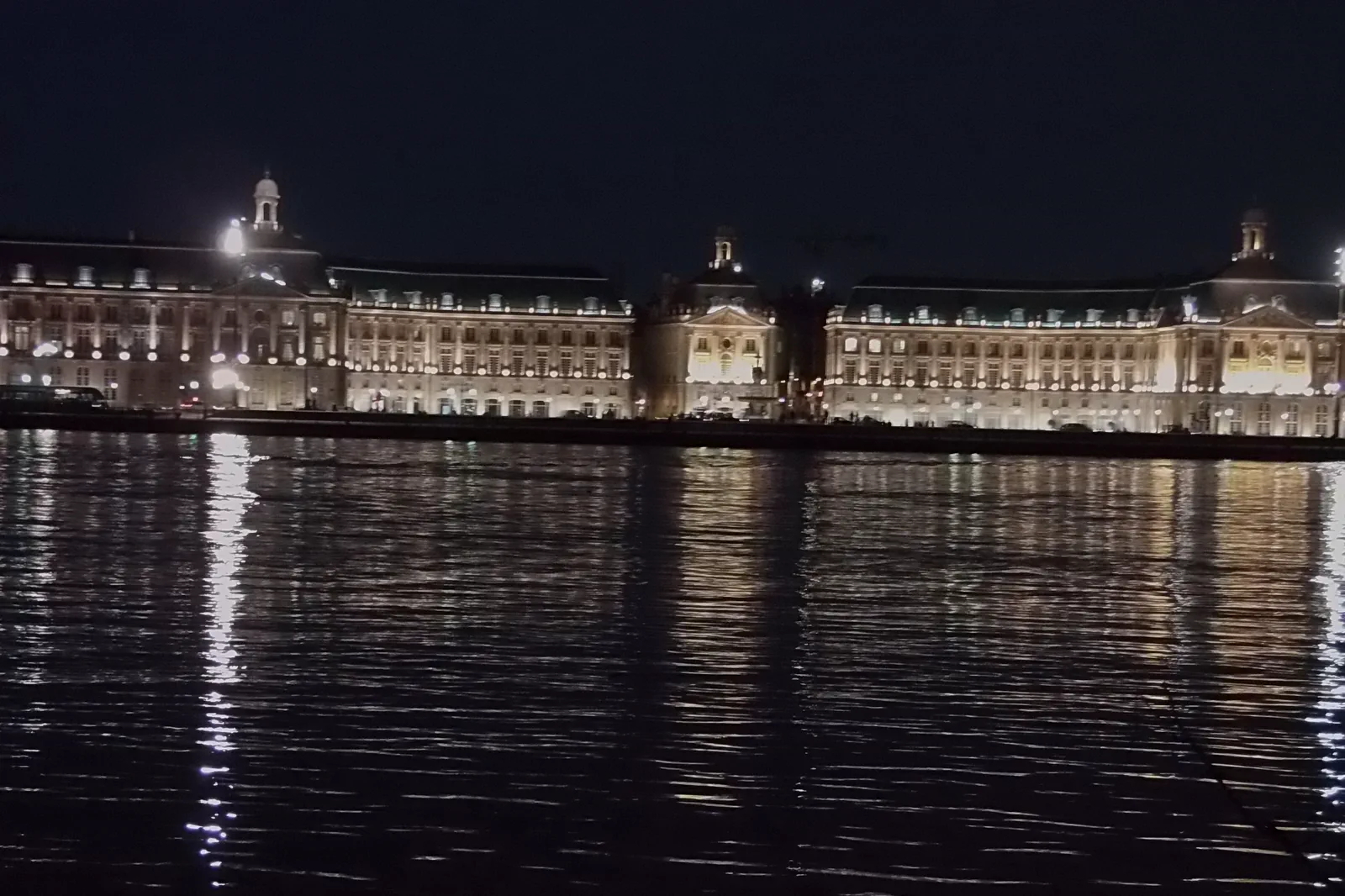Place de la Bourse reflected beside the Garonne in Bordeaux
