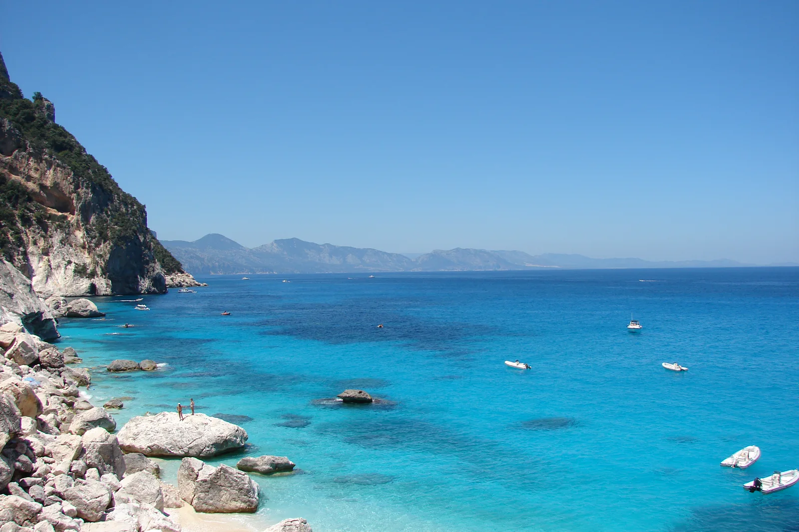 The limestone pinnacle and turquoise water of Cala Goloritzé on the Gulf of Orosei