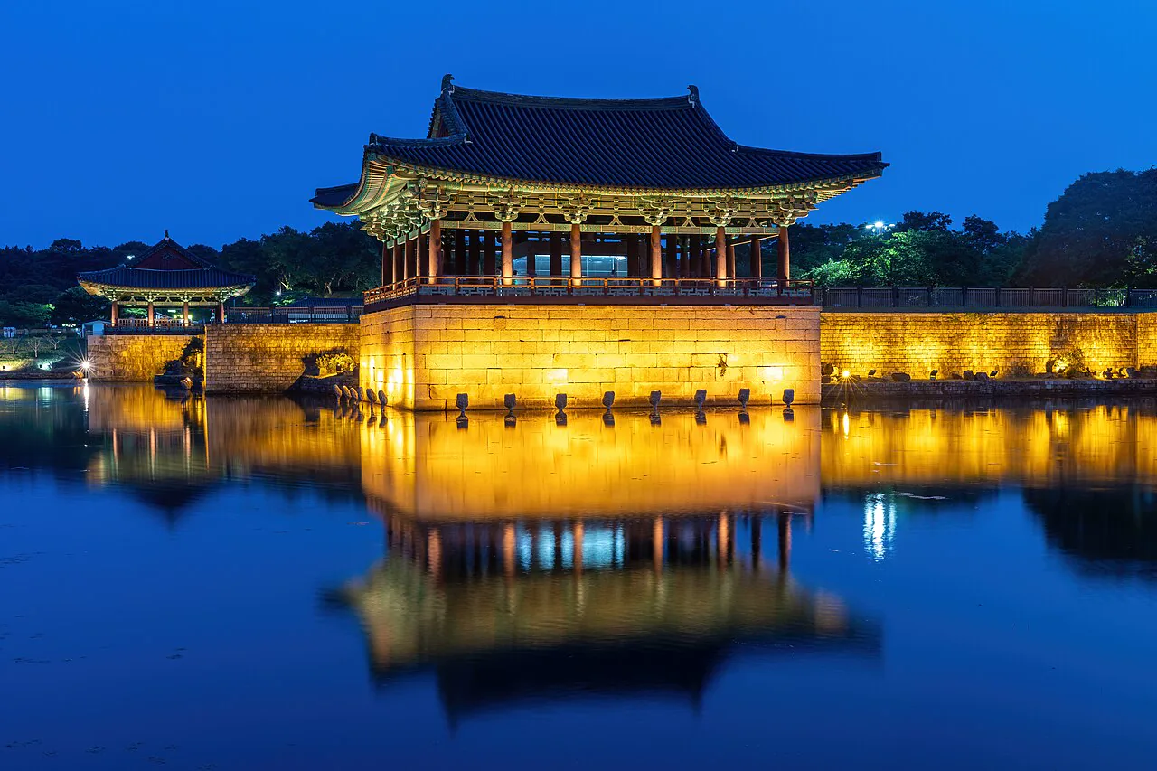 Donggung Palace pavilion reflected in Wolji Pond at blue hour