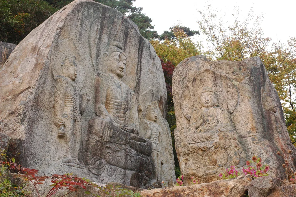Buddhist figures carved into large granite faces at Chilbulam on Gyeongju Namsan