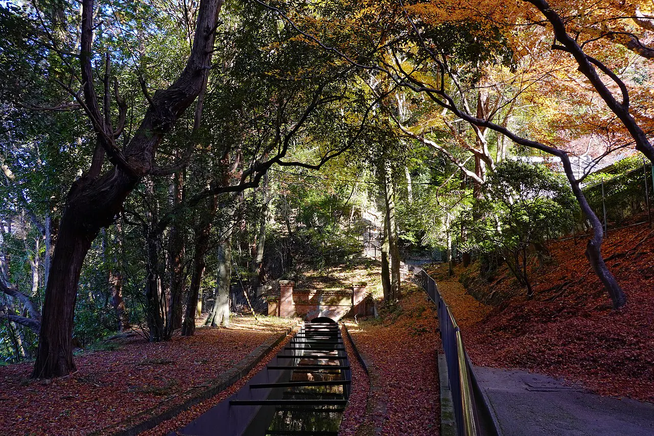 Brick Suirokaku aqueduct among maple trees at Nanzenji