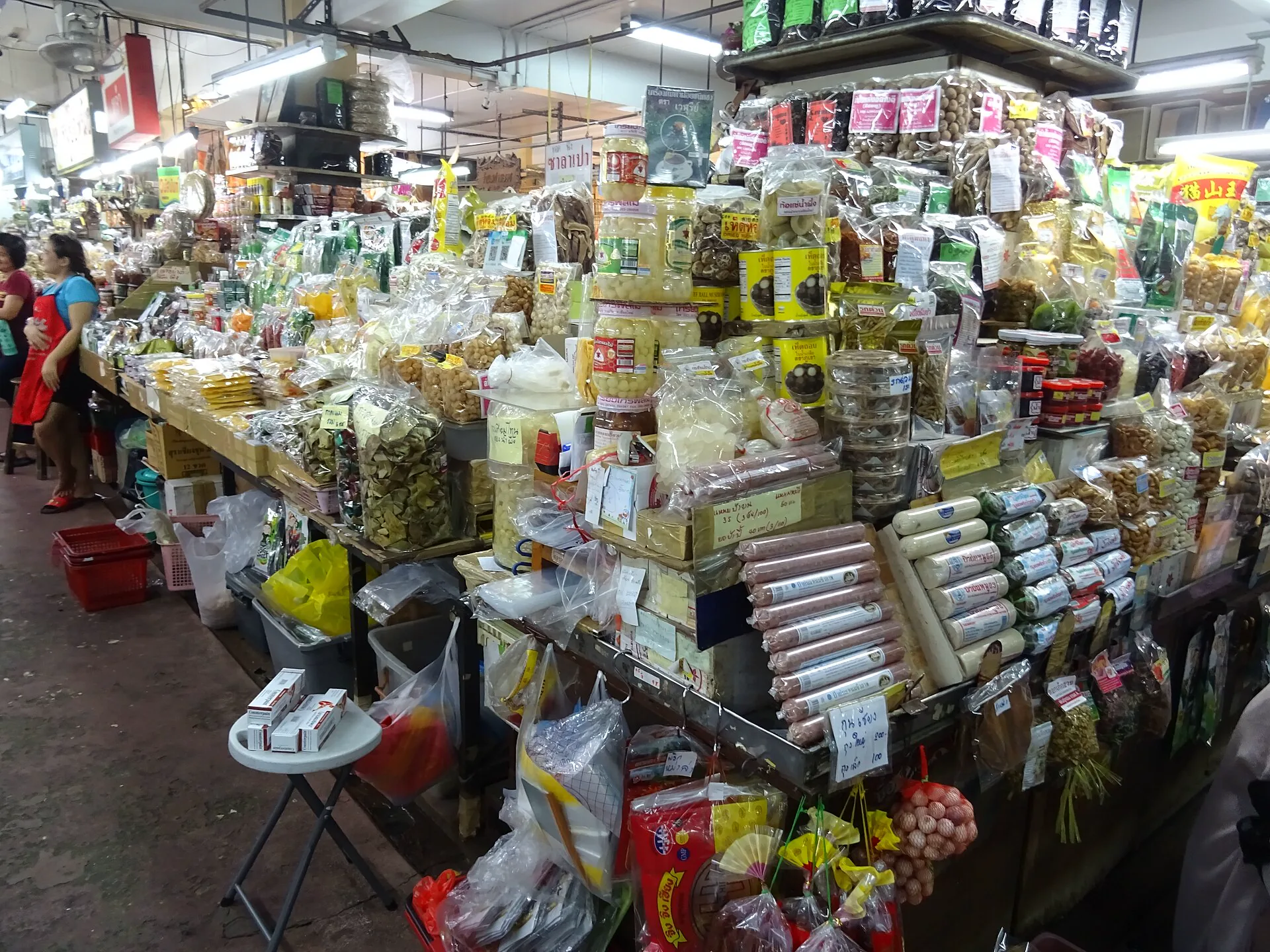 Produce and shoppers inside Warorot Market in Chiang Mai