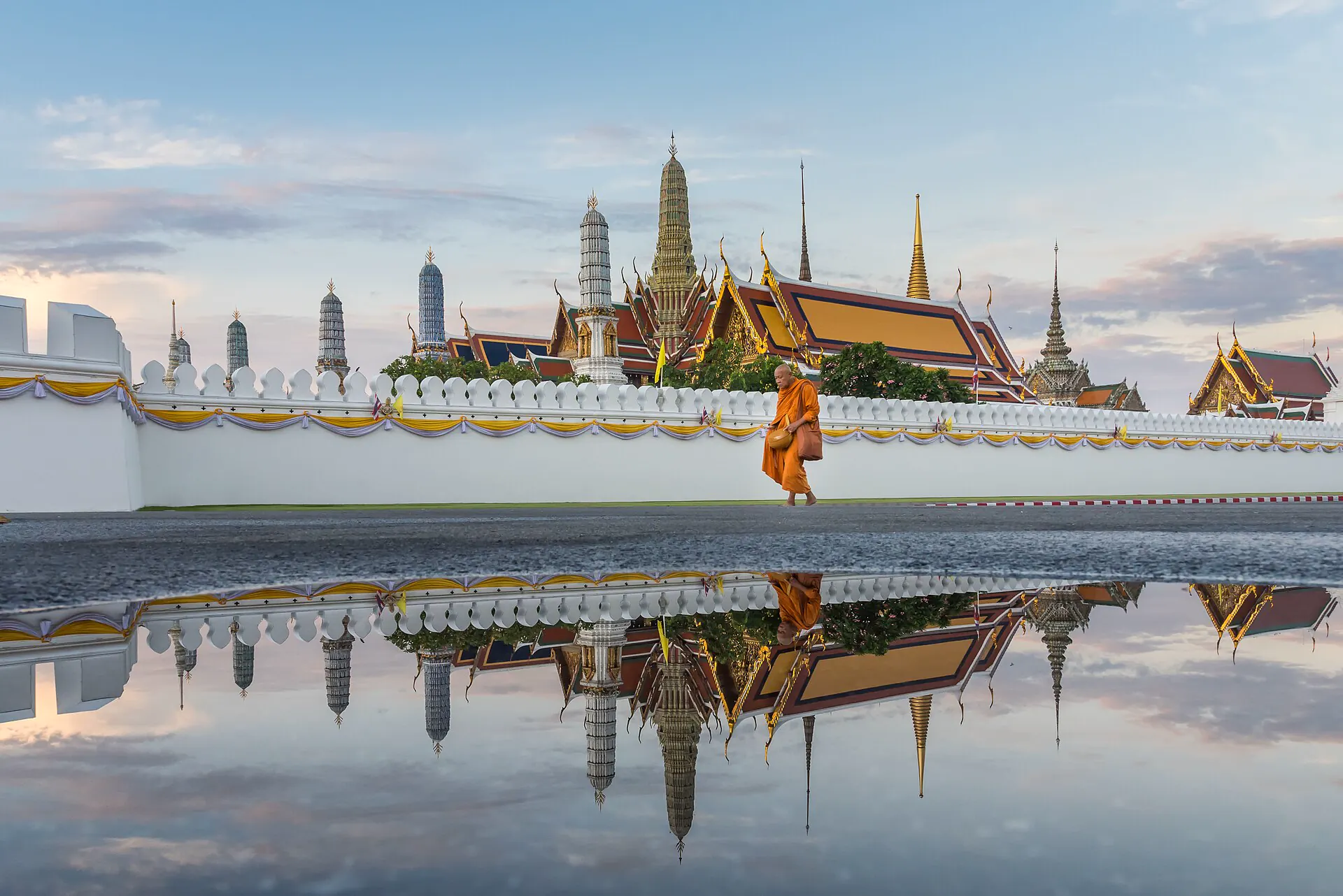 Temple of the Emerald Buddha complex reflected after rain