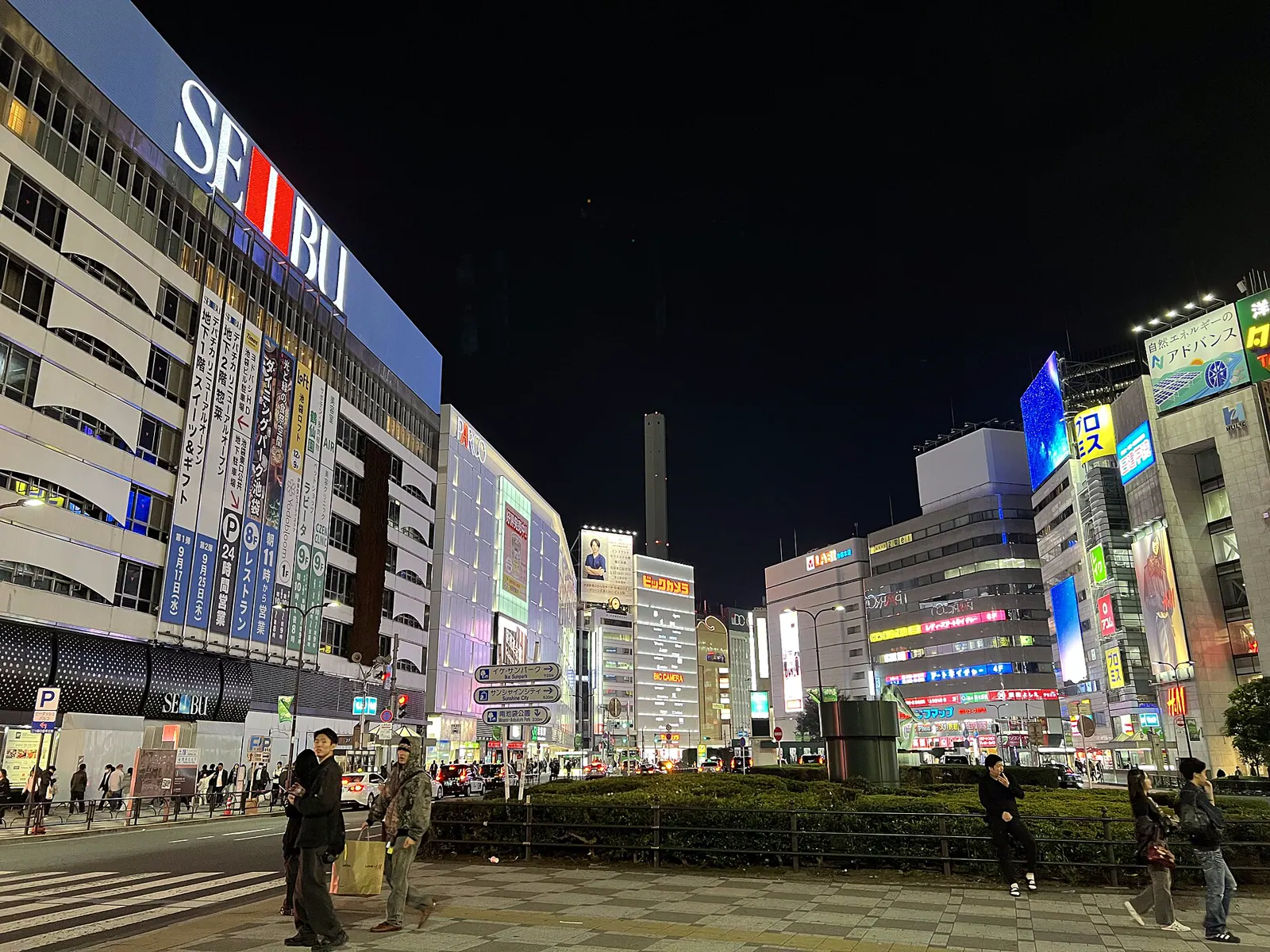 Illuminated commercial buildings on the east side of Ikebukuro Station
